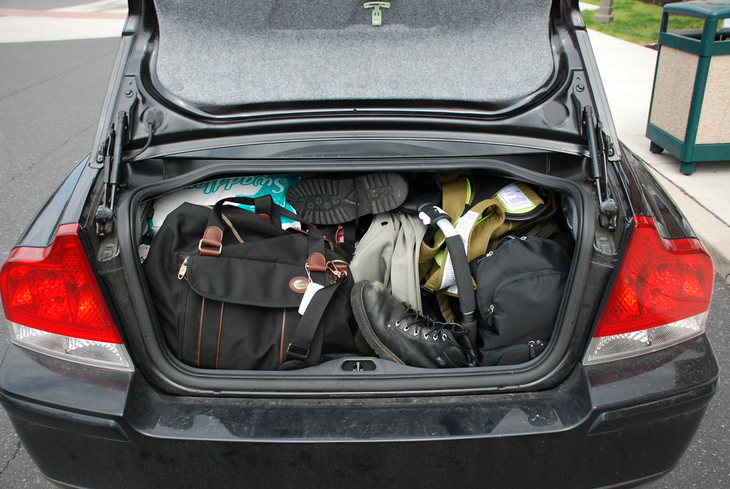 Car boot packed with luggage for private MPV luggage planning before Iskandar Puteri transfer
